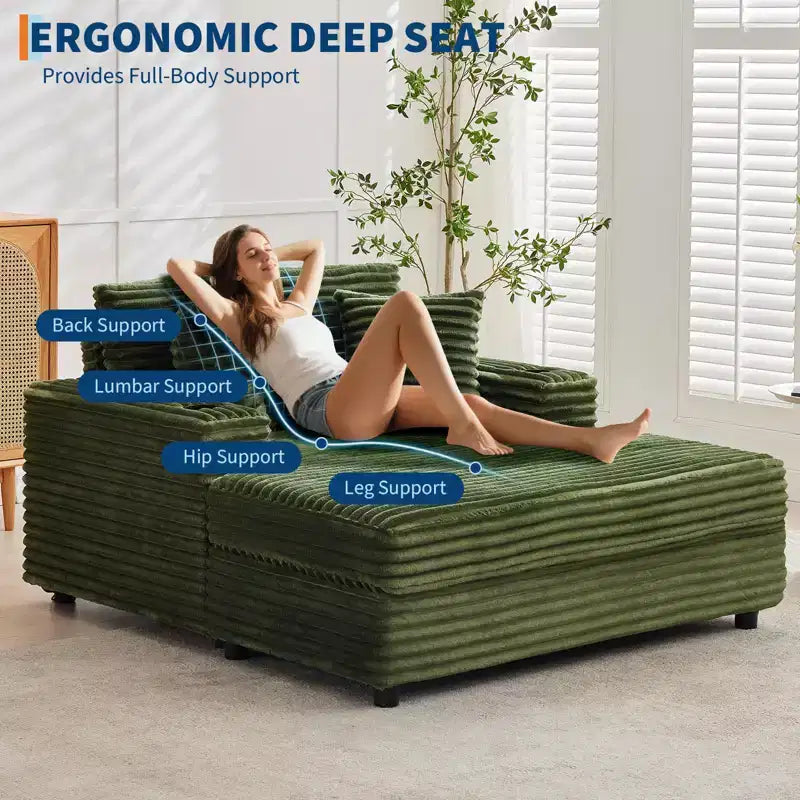 Zielony sztruksowy szezlong dwuosobowy Oversized, rozkładana sofa z poduszkami i uchwytem na kubek